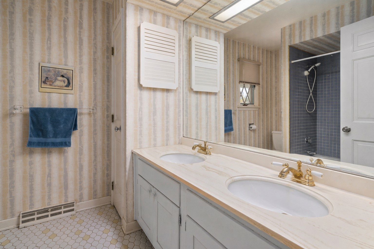 37 Forest Hills Road Lake Bluff, IL 60044 - Photo 32 of 52 a bathroom with double vanity and a mirror