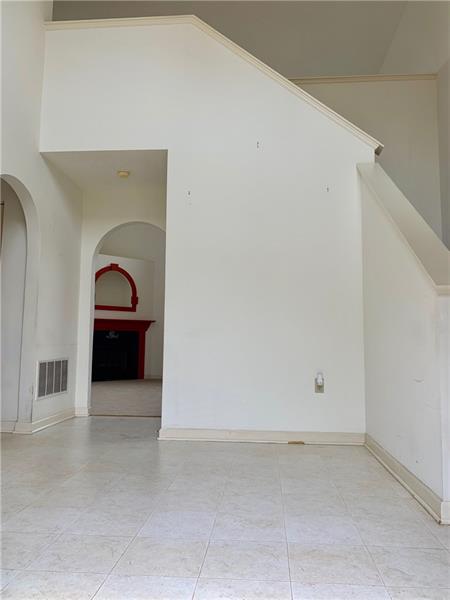 43 Peters Road Greensburg, PA 15601 - Photo 2 of 25 2 STORY ENTRYWAY WITH NEUTRAL FLOORING AND WALLS