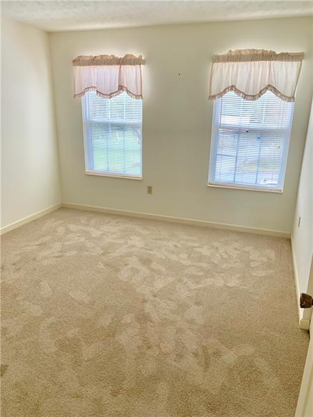 43 Peters Road Greensburg, PA 15601 - Photo 17 of 25 BEDROOM #3 WITH NEUTRAL WALLS AND NEW FLOORING