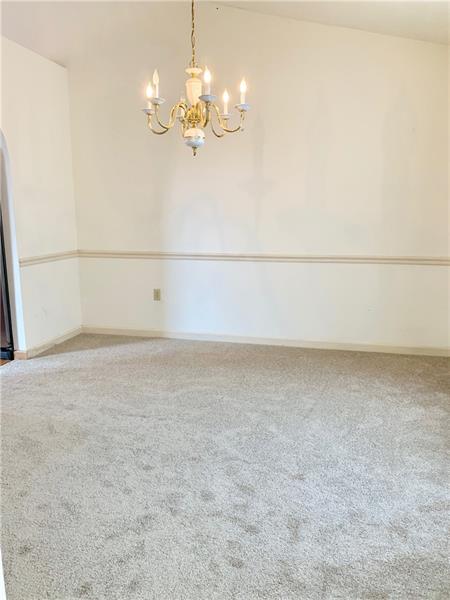 43 Peters Road Greensburg, PA 15601 - Photo 3 of 25 DINING ROOM WITH NEW CARPET & NEUTRAL WALLS