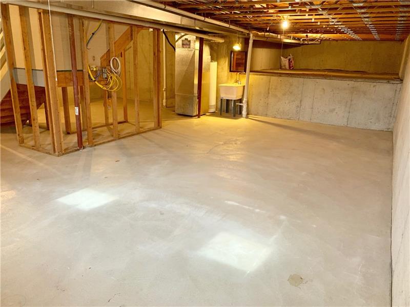 43 Peters Road Greensburg, PA 15601 - Photo 22 of 25 PART OF THE HUGE BASEMENT. POURED CONCRETE WALLS
