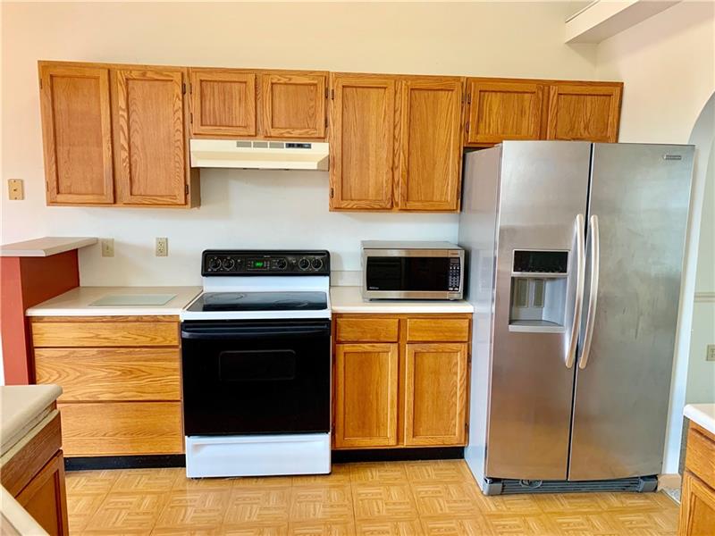 43 Peters Road Greensburg, PA 15601 - Photo 5 of 25 OAK KITCHEN WITH NEUTRAL COUNTER TOPS. KIT IS OPEN TO EATING AREA AND LIVING ROOM
