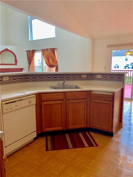 43 Peters Road Greensburg, PA 15601 - Photo 7 of 25 kitchen over looking living room and open to the eating area.