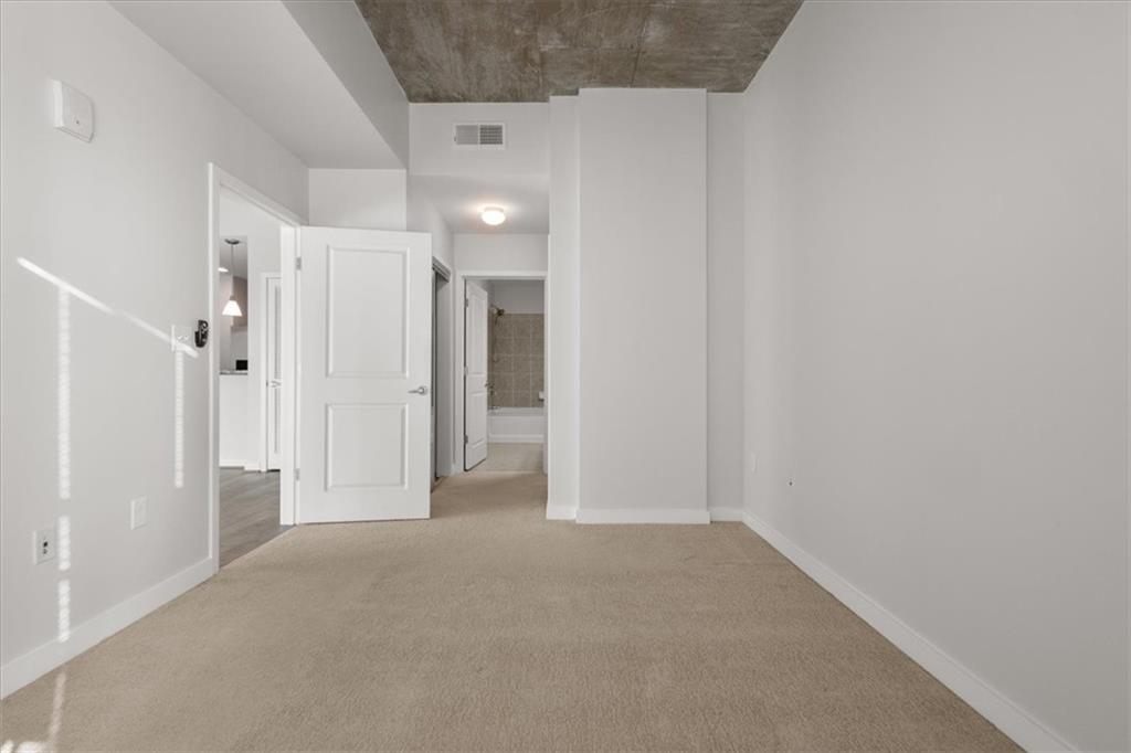 250 Pharr Road Northeast, Unit 309 Atlanta, GA 30305 - Photo 16 of 37 a view of empty room