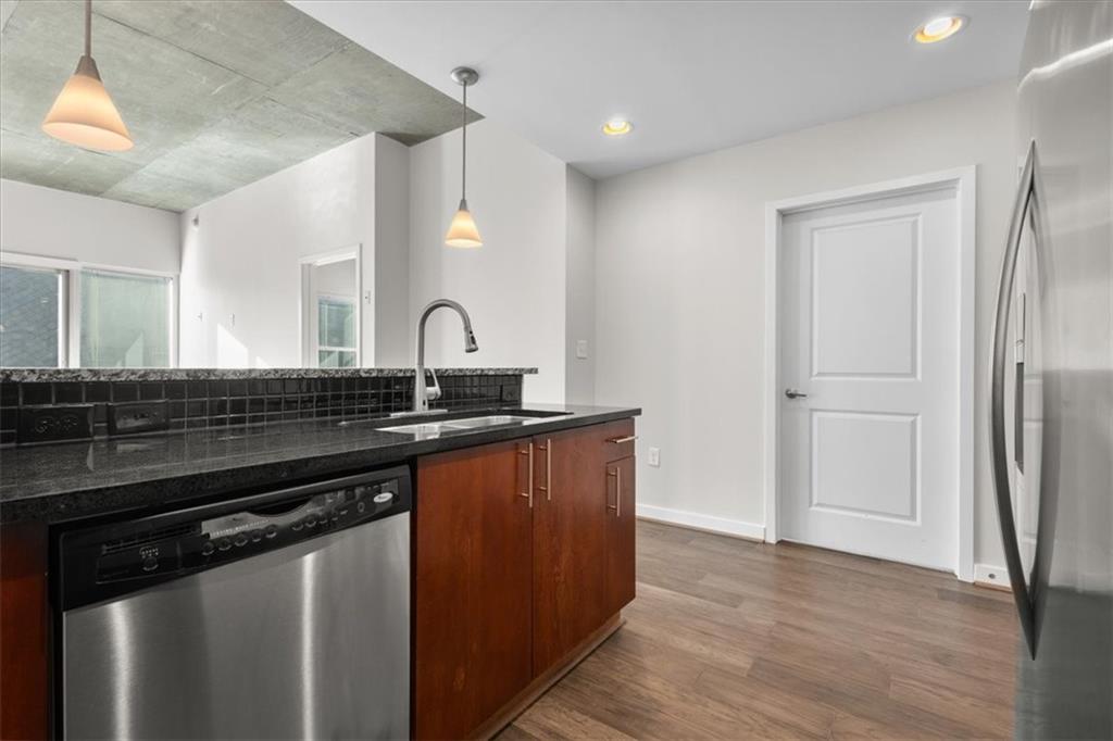 250 Pharr Road Northeast, Unit 309 Atlanta, GA 30305 - Photo 8 of 37 a close view of a sink a counter space and utility room