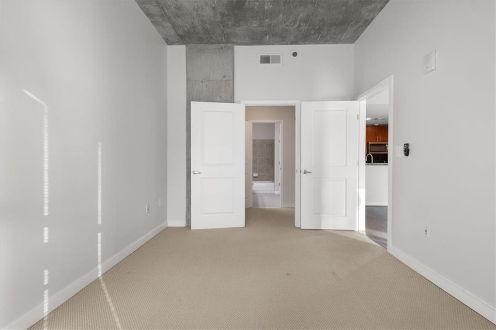 250 Pharr Road Northeast, Unit 309 Atlanta, GA 30305 - Photo 10 of 37 a view of a kitchen