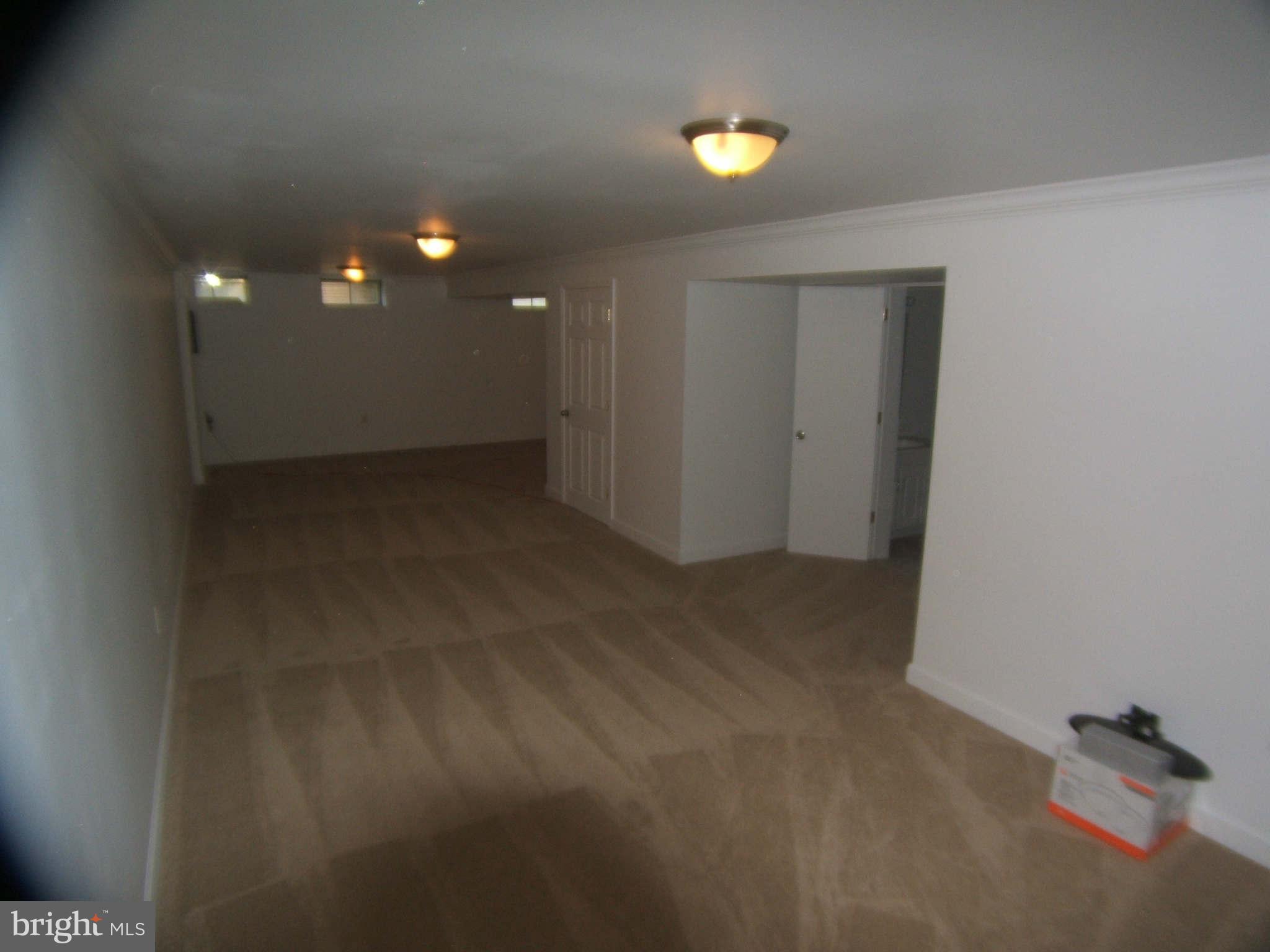 19113 Staleybridge Road Germantown, MD 20876 - Photo 12 of 17 a view of hallway with livingroom