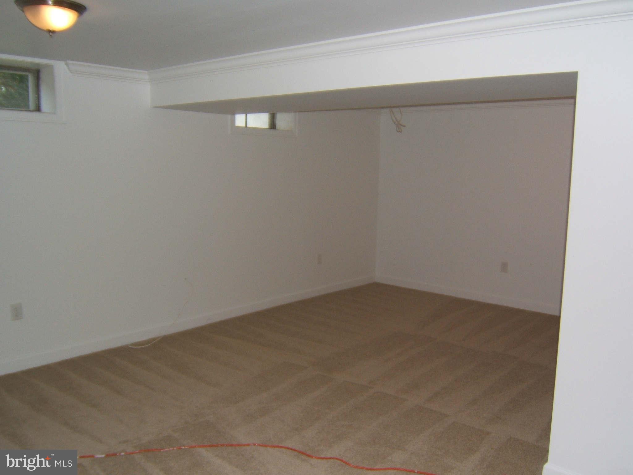 19113 Staleybridge Road Germantown, MD 20876 - Photo 14 of 17 a view of an empty room