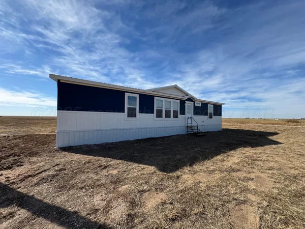 a black and white photo of a living room