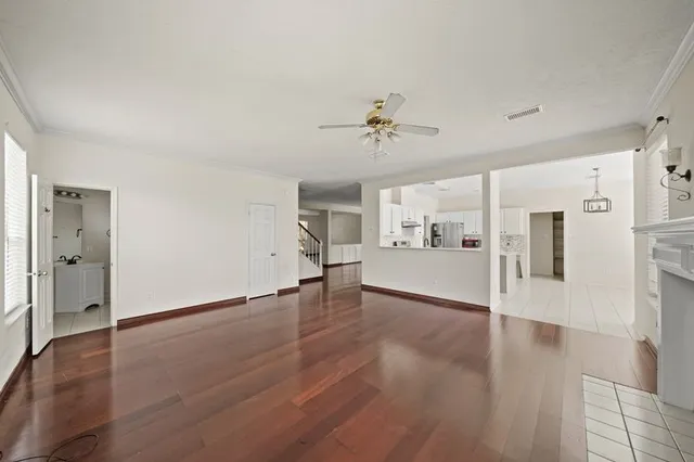 a view of a livingroom with wooden floor
