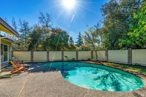 a view of a backyard with a small cabin