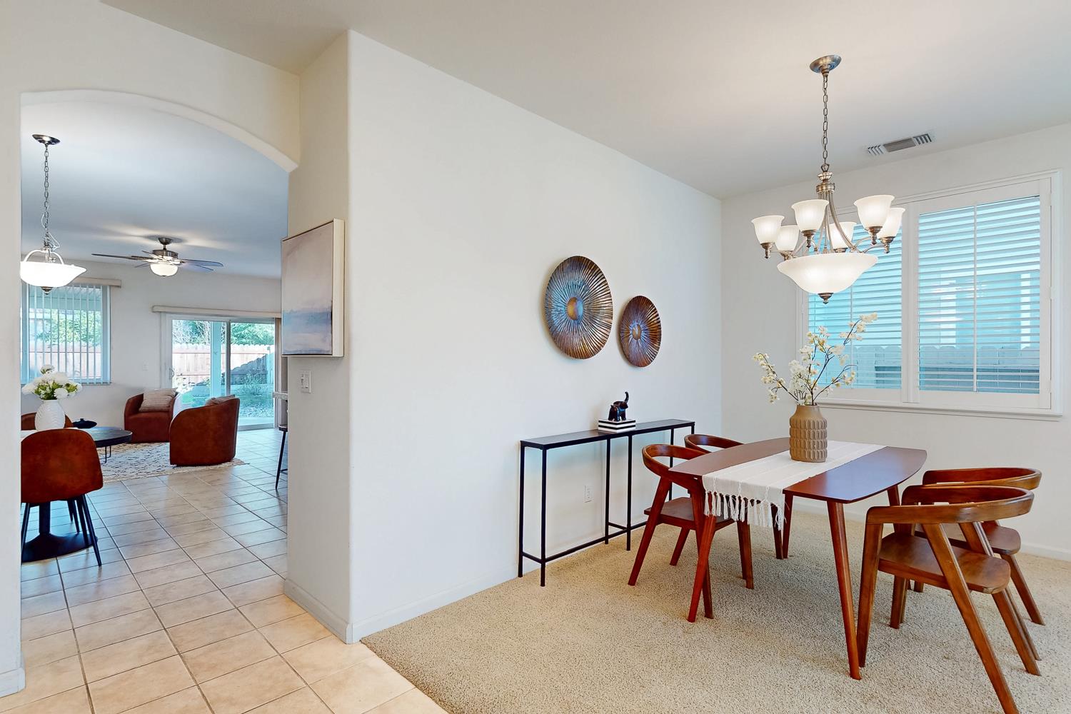 1920 Indiana Street Gridley, CA 95948 - Photo 25 of 66 a view of a dining room with furniture and chandelier
