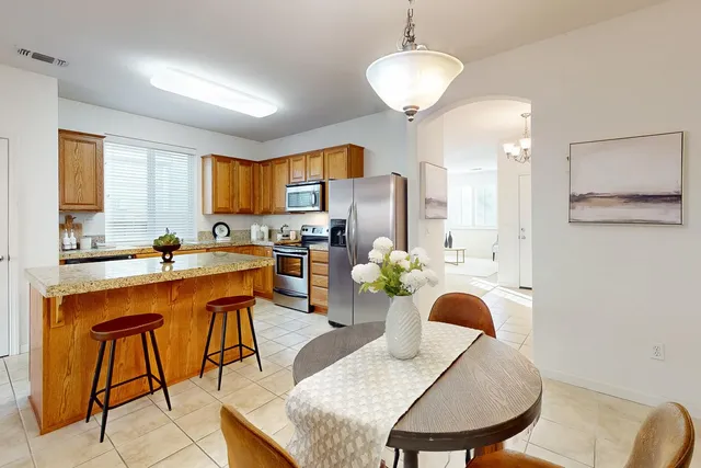 a bathroom with a double vanity sink mirror and double