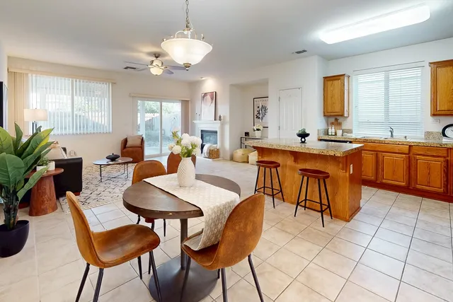 a bedroom with a bed and a chair