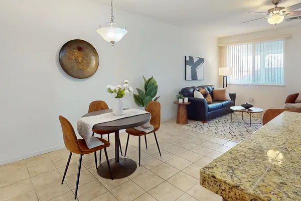 a view of a workspace with furniture