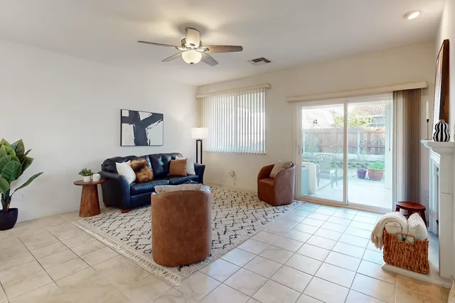 a bedroom with bed and a couch