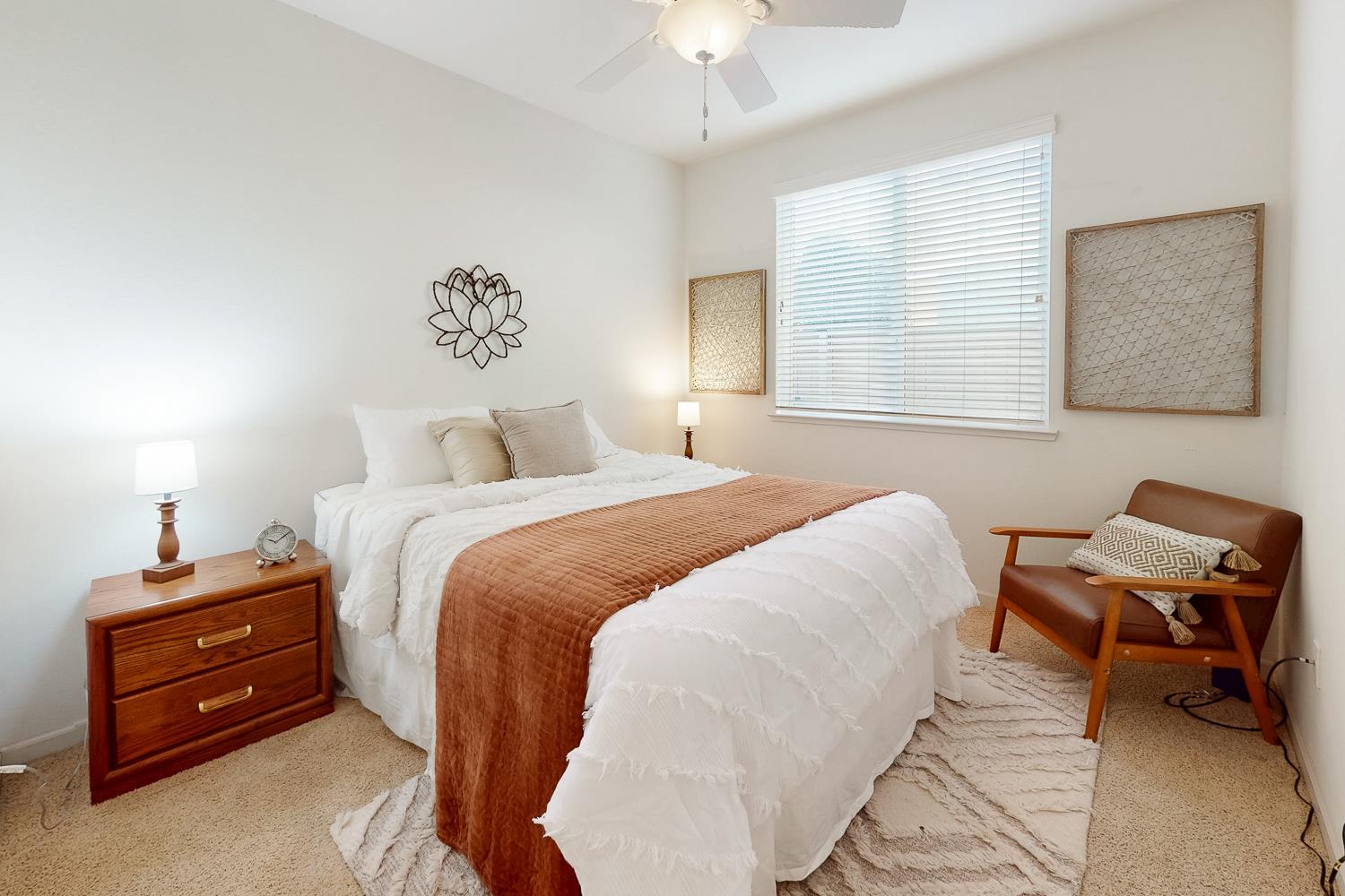 1920 Indiana Street Gridley, CA 95948 - Photo 46 of 66 a bedroom with a bed and a chair