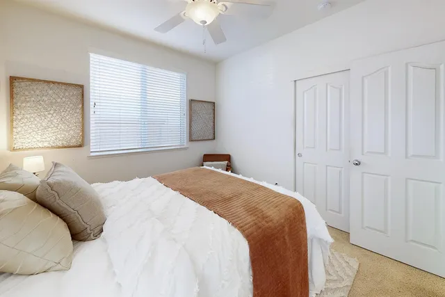 a picture of a bench in front of a window