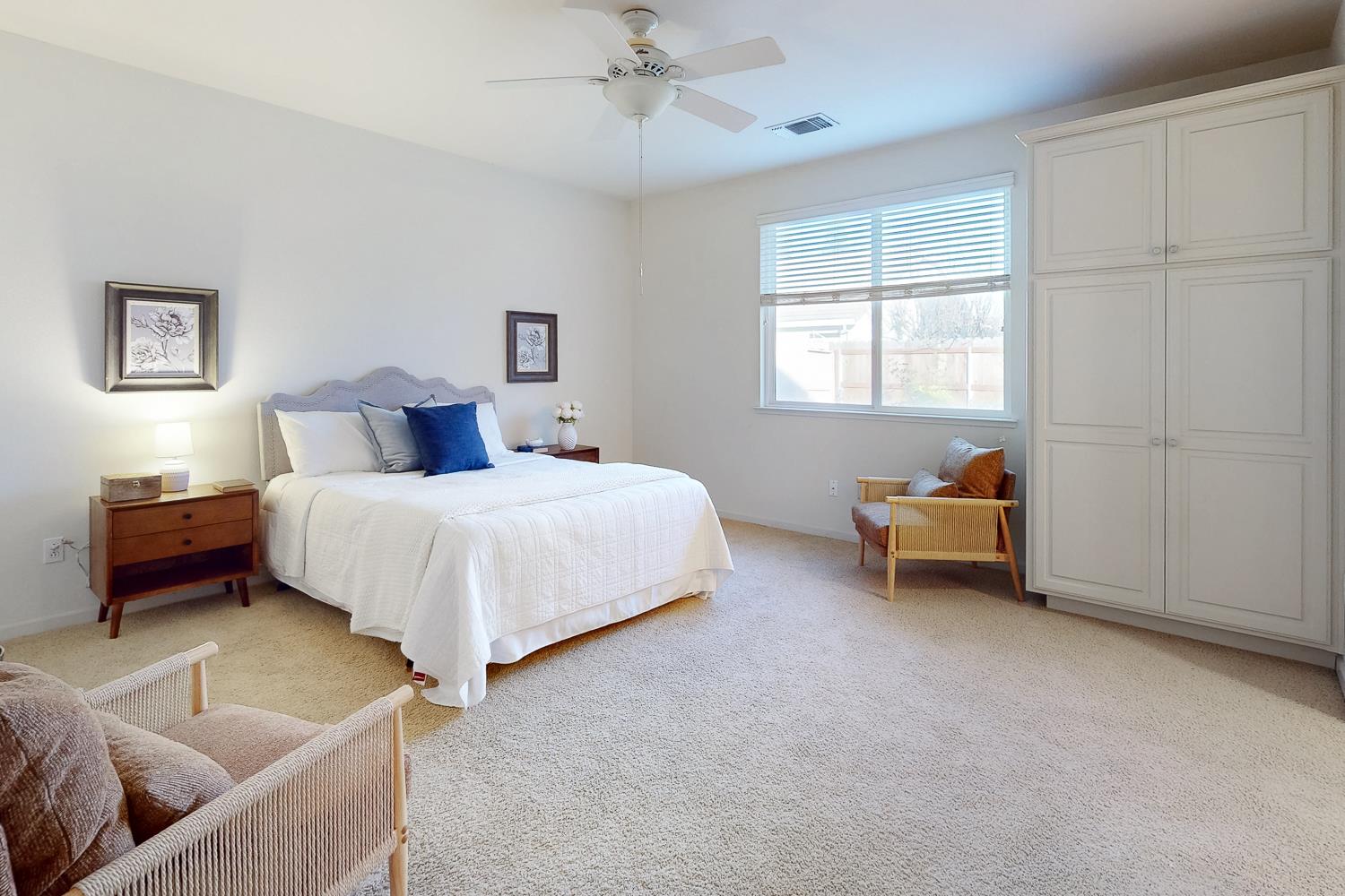 1920 Indiana Street Gridley, CA 95948 - Photo 50 of 66 a bedroom with bed and a couch