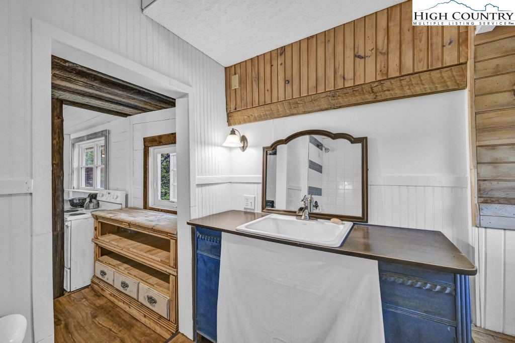 244 Flat Springs Road Elk Park, NC 28622 - Photo 21 of 47 a kitchen with a sink and cabinets