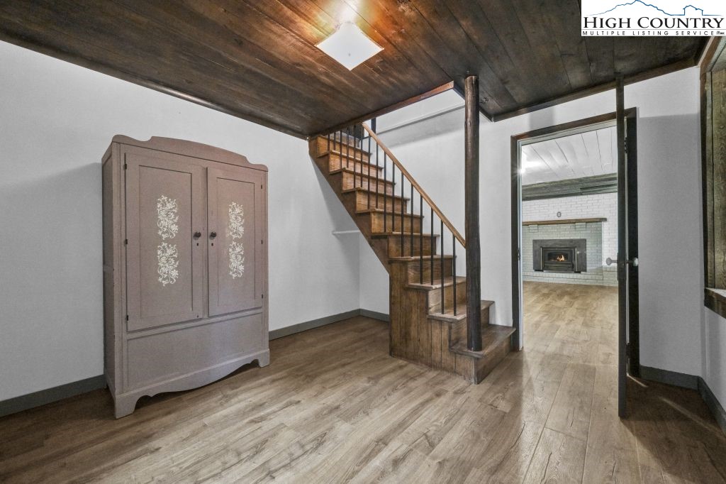 244 Flat Springs Road Elk Park, NC 28622 - Photo 27 of 47 a view of entryway and hall with wooden floor