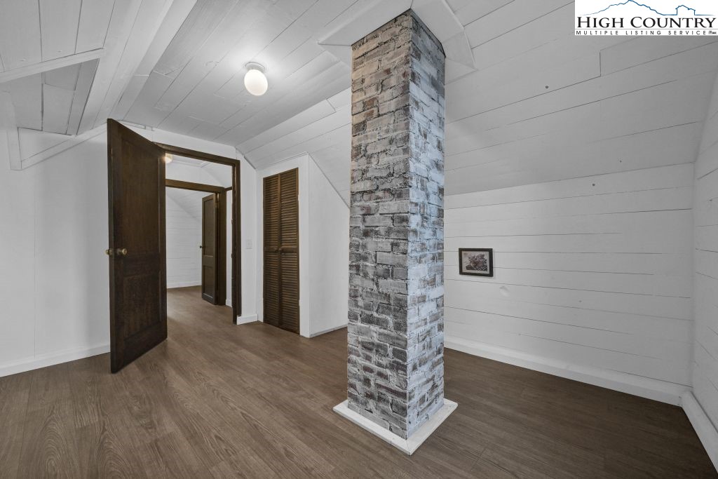 244 Flat Springs Road Elk Park, NC 28622 - Photo 31 of 47 a view of gallery with wooden floor