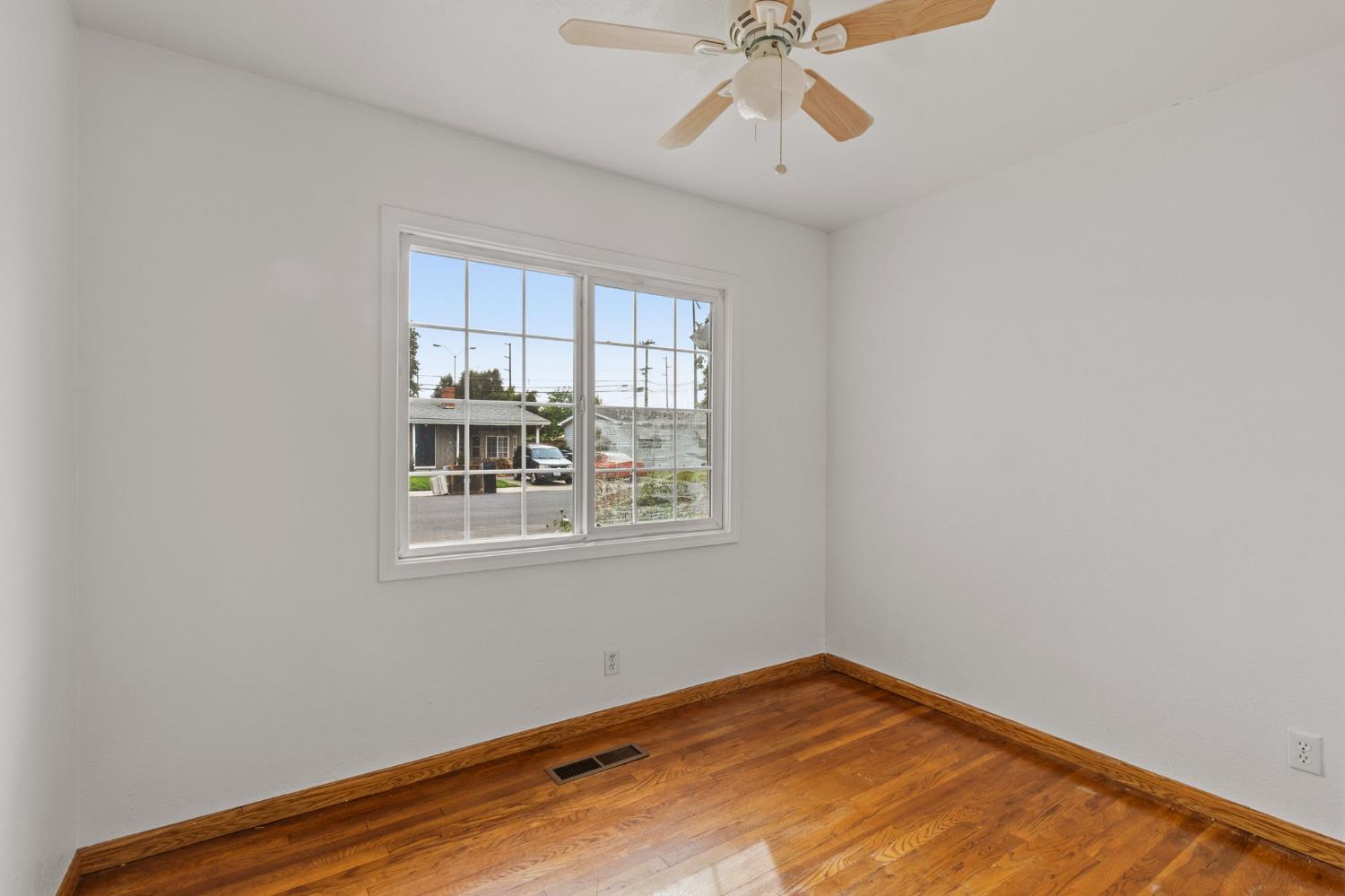 1805 Aloha Way Modesto, CA 95350 - Photo 14 of 24 a view of an empty room with a window