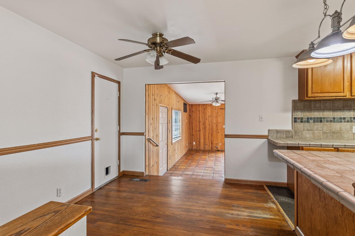1805 Aloha Way Modesto, CA 95350 - Photo 7 of 24 a view of a kitchen with a sink and wooden floor