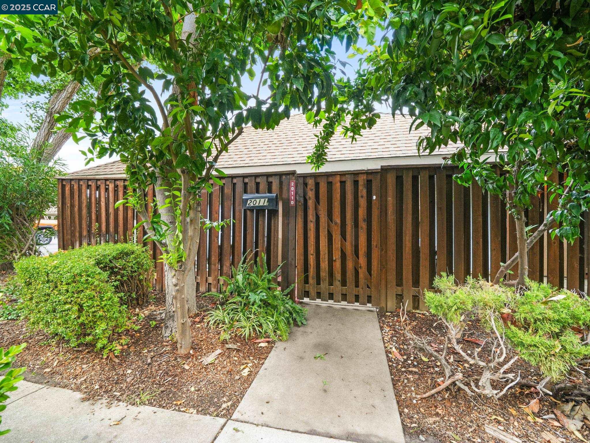 2011 Olivera Road, Unit D Concord, CA 94520 - Photo 18 of 24 a view of a pathway in a garden