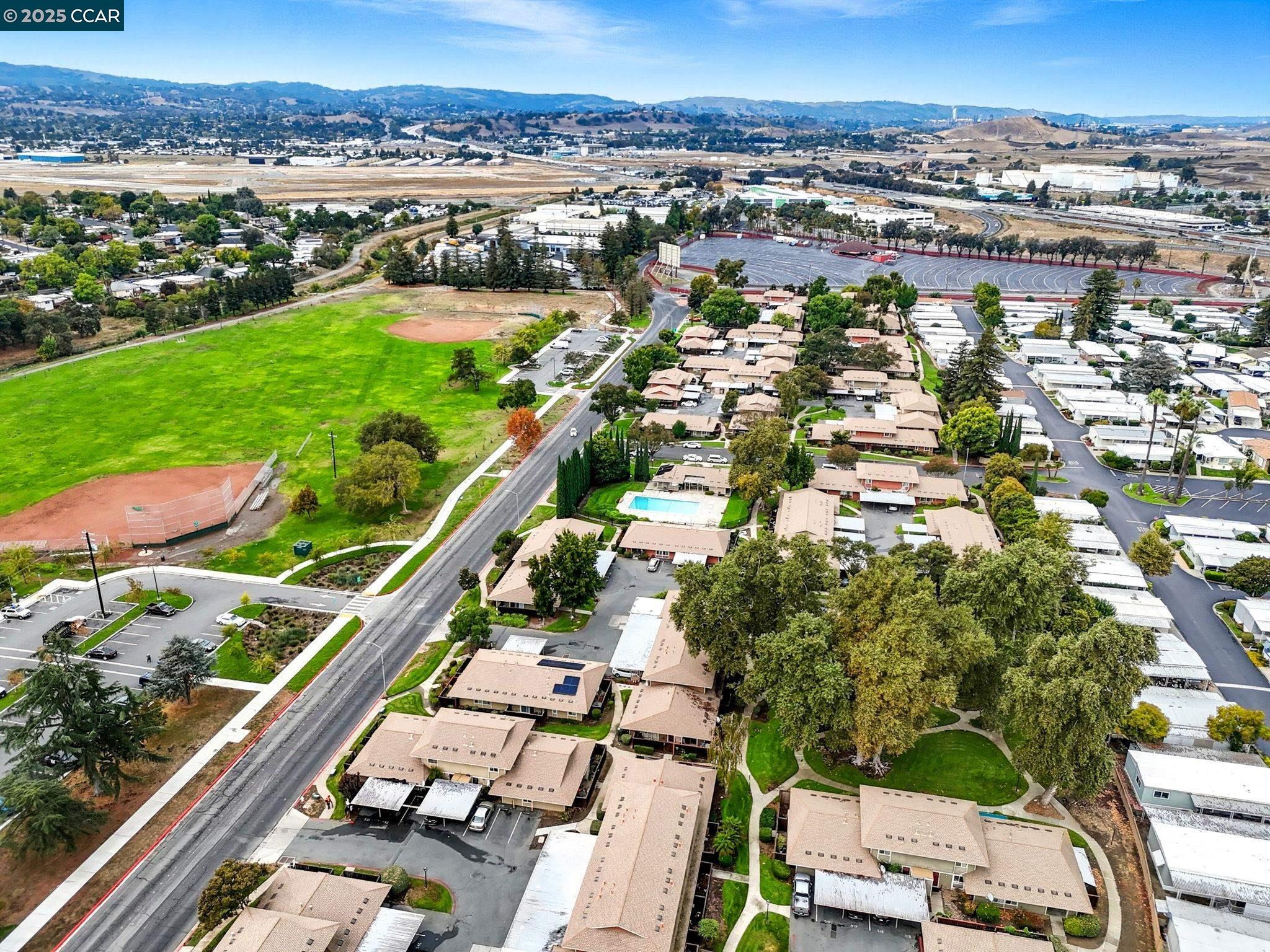 2011 Olivera Road, Unit D Concord, CA 94520 - Photo 20 of 24 an aerial view of residential houses with outdoor space