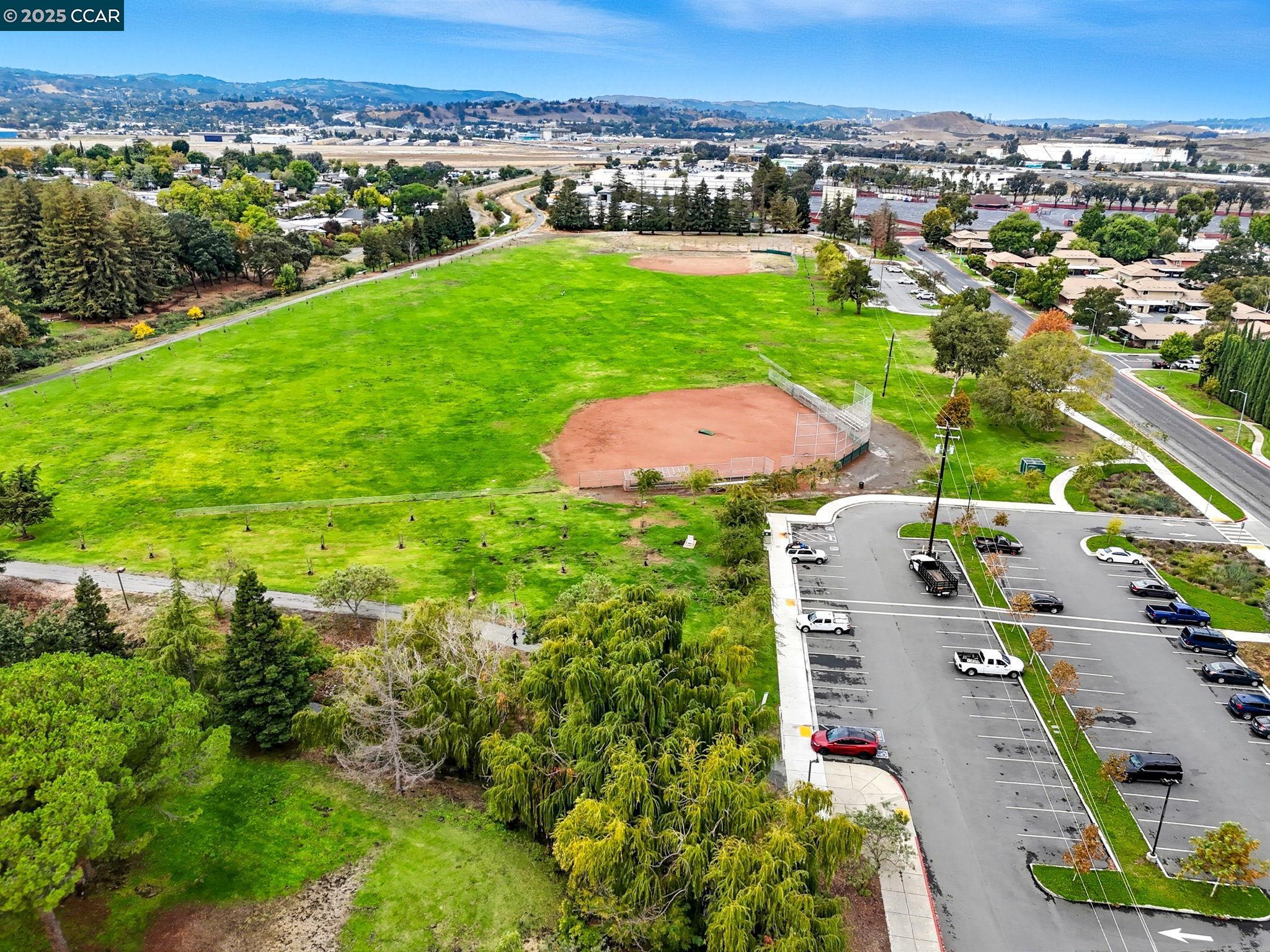 2011 Olivera Road, Unit D Concord, CA 94520 - Photo 21 of 24 an aerial view of a houses with a yard