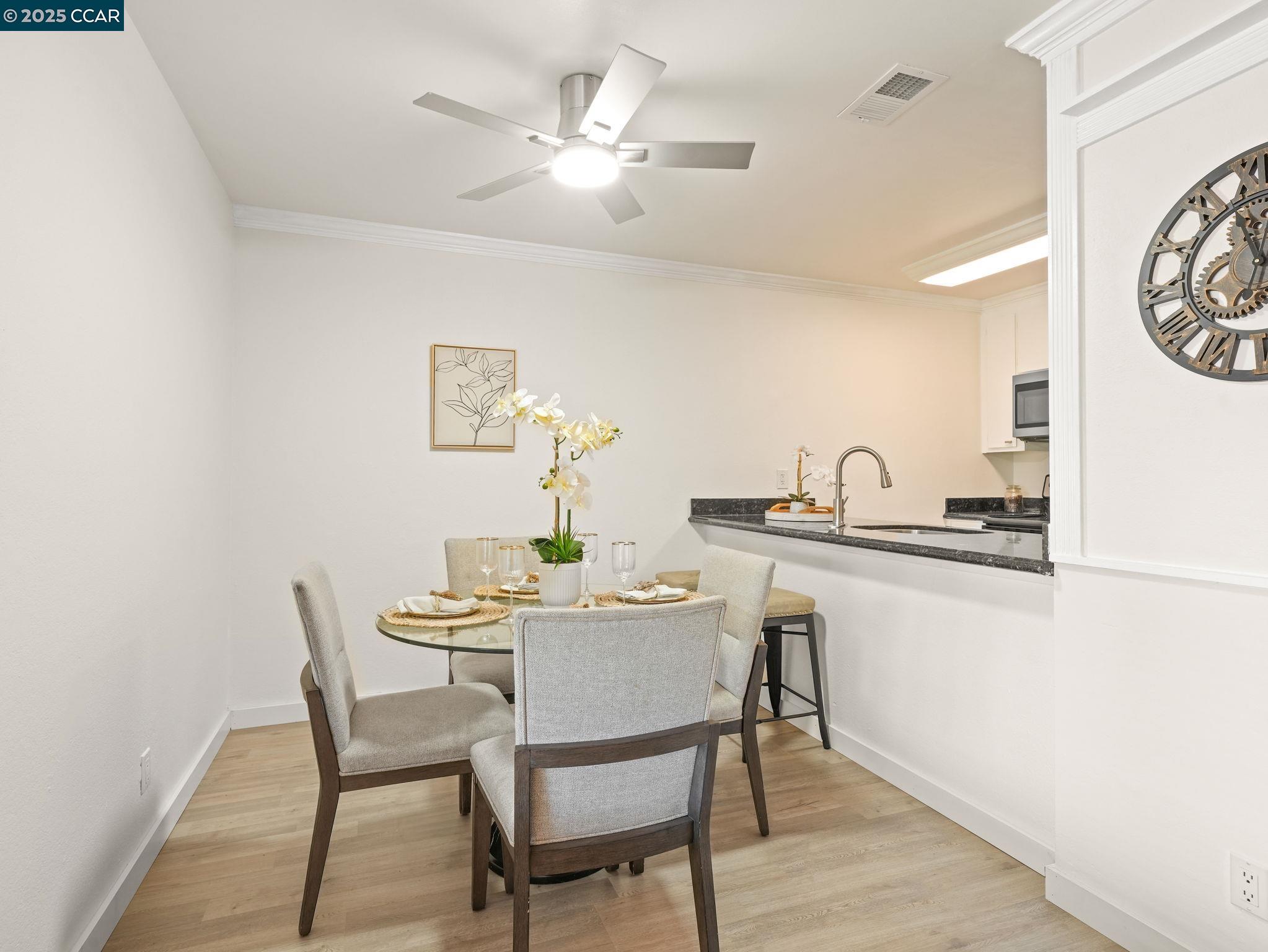 2011 Olivera Road, Unit D Concord, CA 94520 - Photo 4 of 24 a dining room with furniture and window