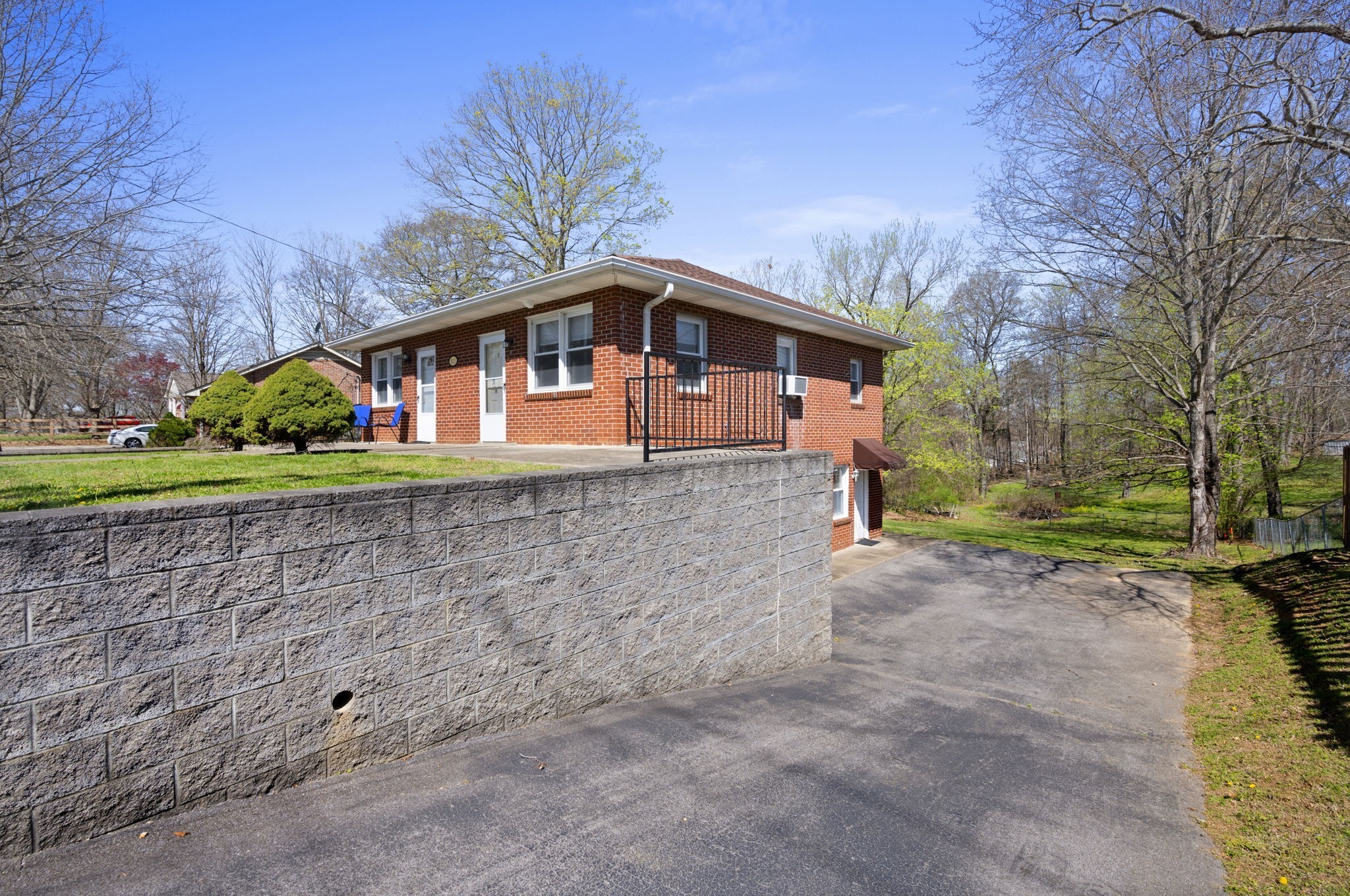 521 Hawkins Road, Unit 2 Clarksville, TN 37040 - Photo 16 of 16 a front view of a house with a yard