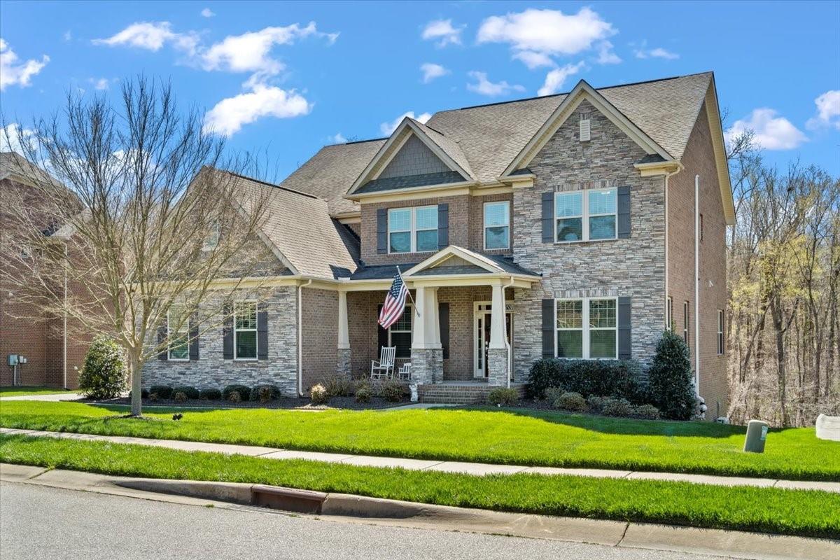 8131 Clems Branch Road Indian Land, SC 29707 - Photo 1 of 47 a front view of a house with a yard