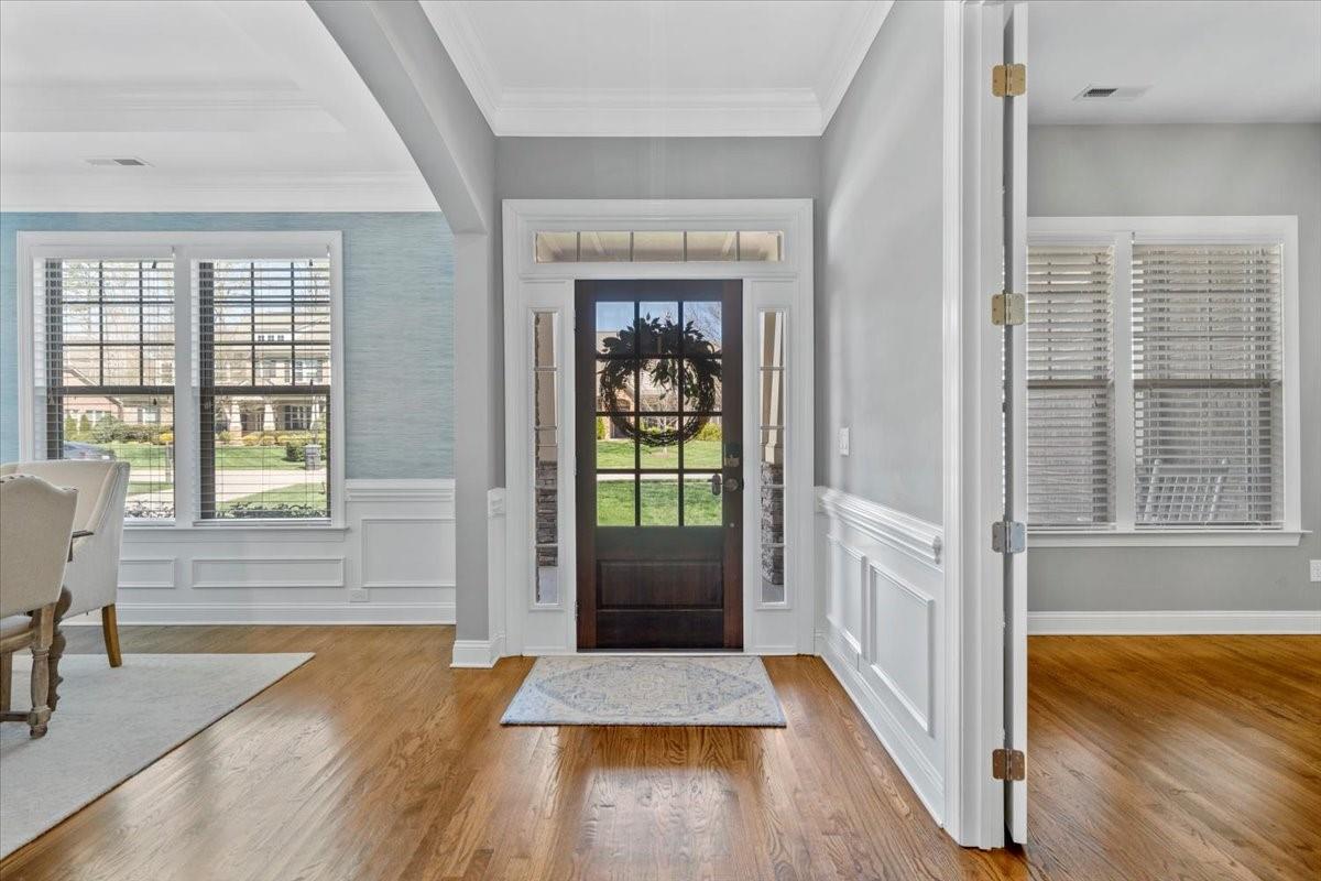 8131 Clems Branch Road Indian Land, SC 29707 - Photo 4 of 47 a view of front door with wooden floor and a window
