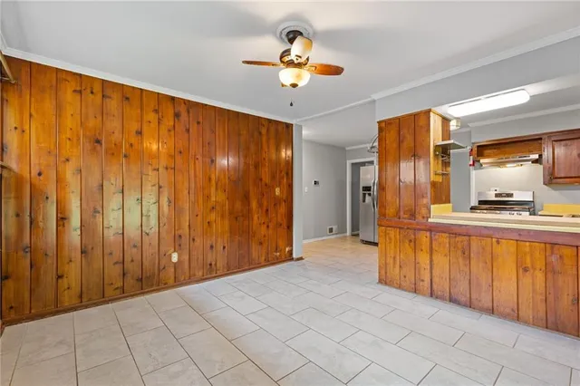 a view of a hallway with a chandelier