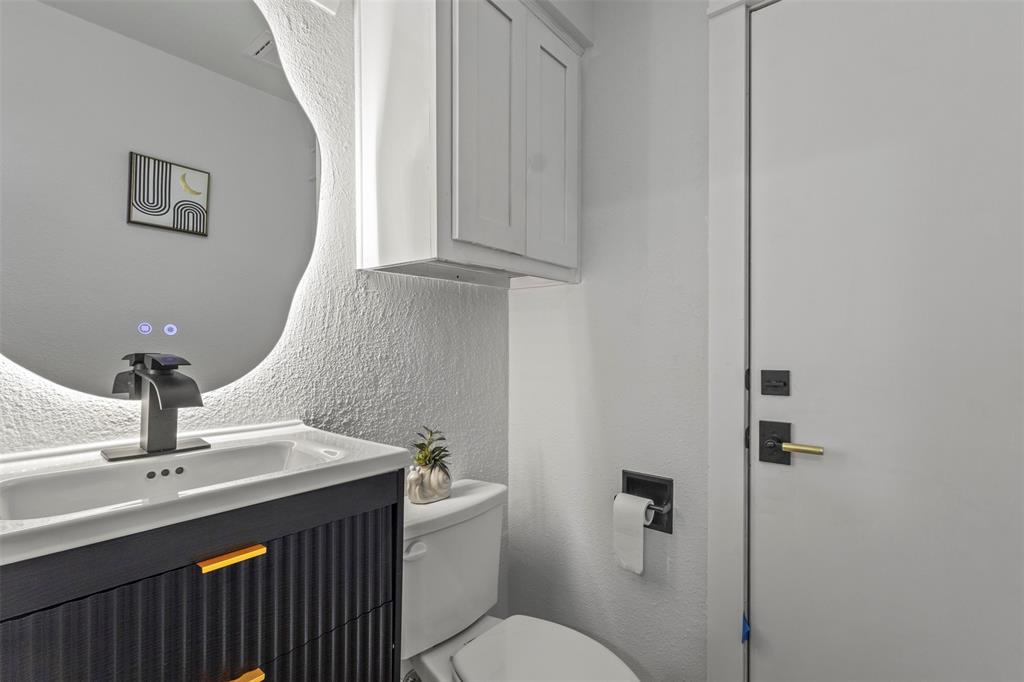 1 Spring Valley Court Richardson, TX 75081 - Photo 14 of 40 Separate bathroom with toilet and vanity