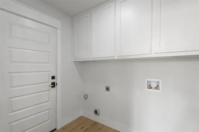 a view of room with cabinets