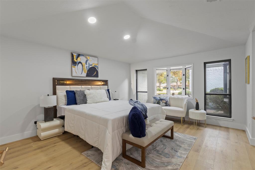 1 Spring Valley Court Richardson, TX 75081 - Photo 25 of 40 Bedroom featuring lofted ceiling, light wood-style flooring, and recessed lighting