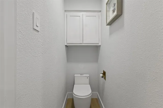a bathroom with a toilet