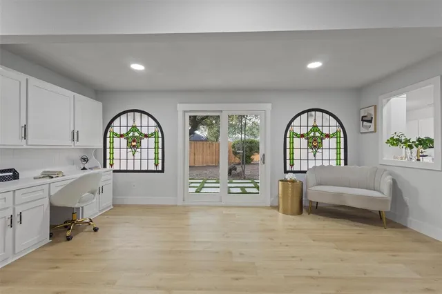 a living room with furniture and a window