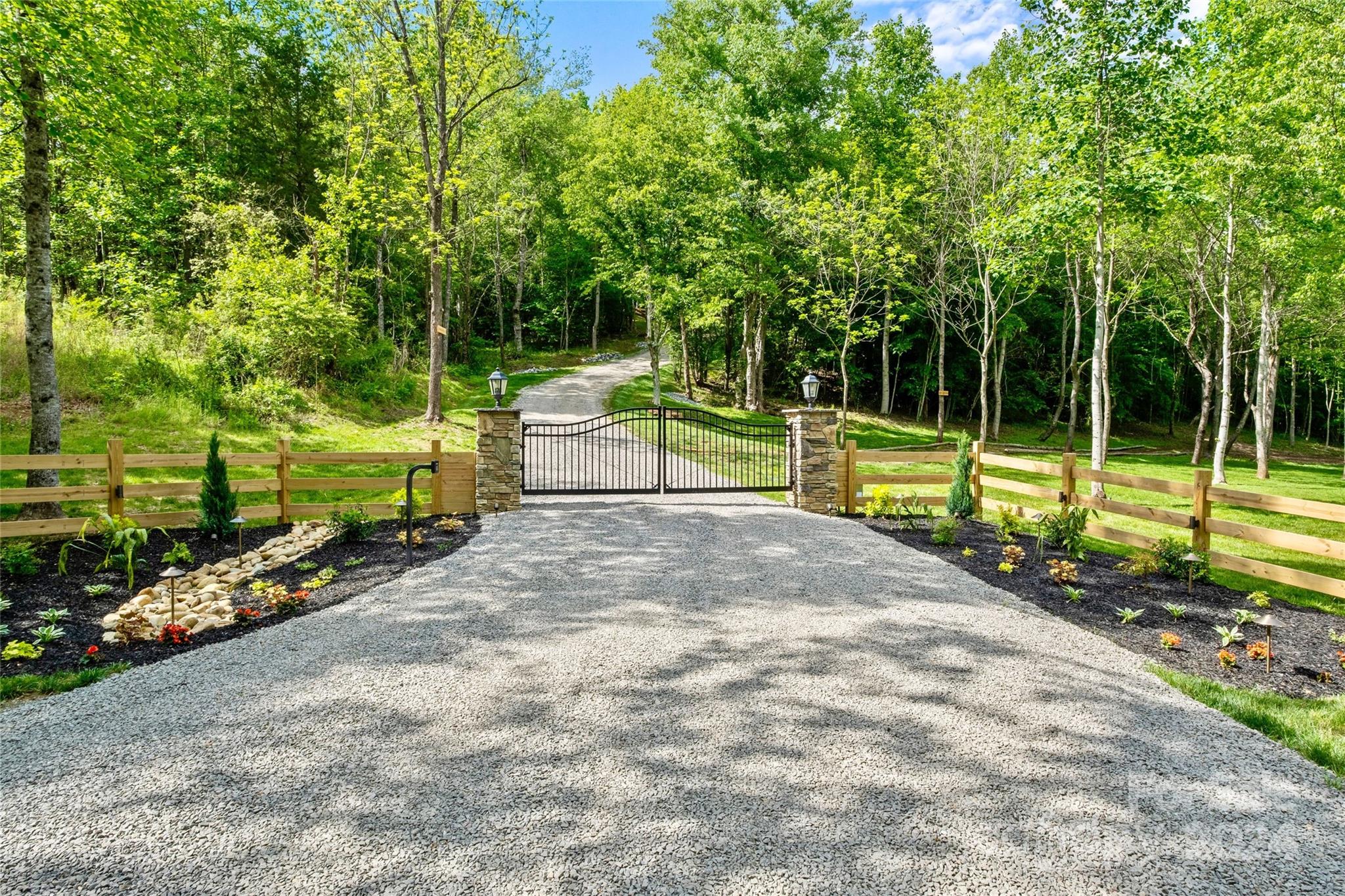 246 Rupard Road Statesville, NC 28625 - Photo 1 of 44 a view of a park with large trees