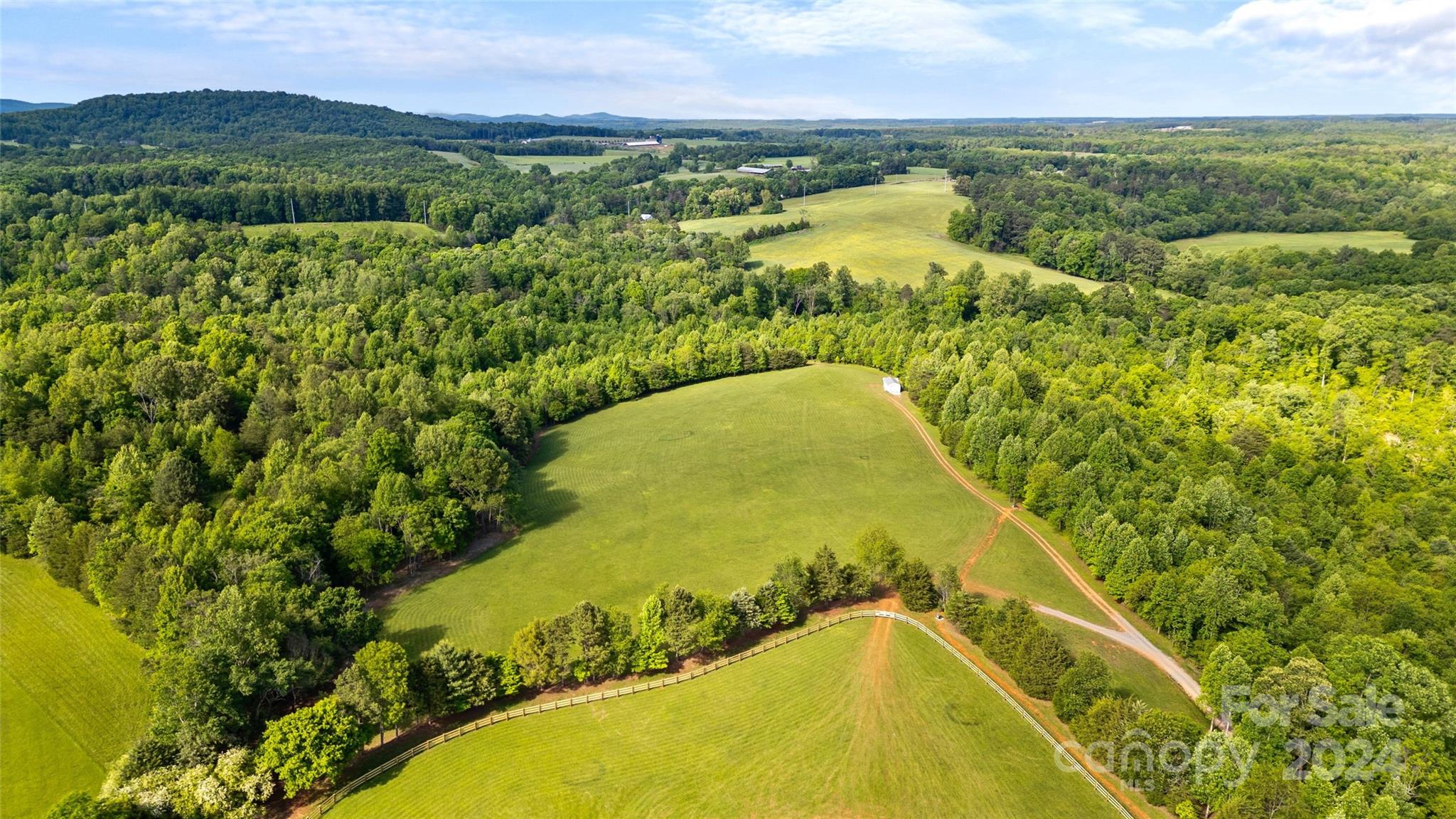 246 Rupard Road Statesville, NC 28625 - Photo 27 of 44 a view of a swimming pool with a lake view