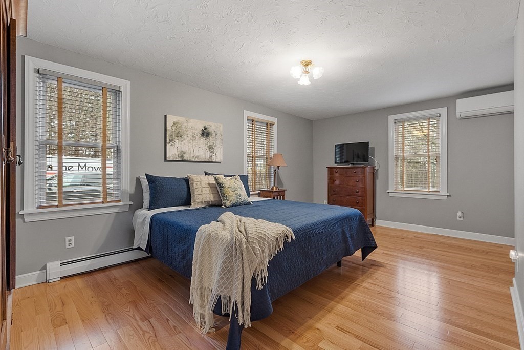49 Central Tree Road Rutland, MA 01543 - Photo 16 of 42 a bed room with a bed and a window