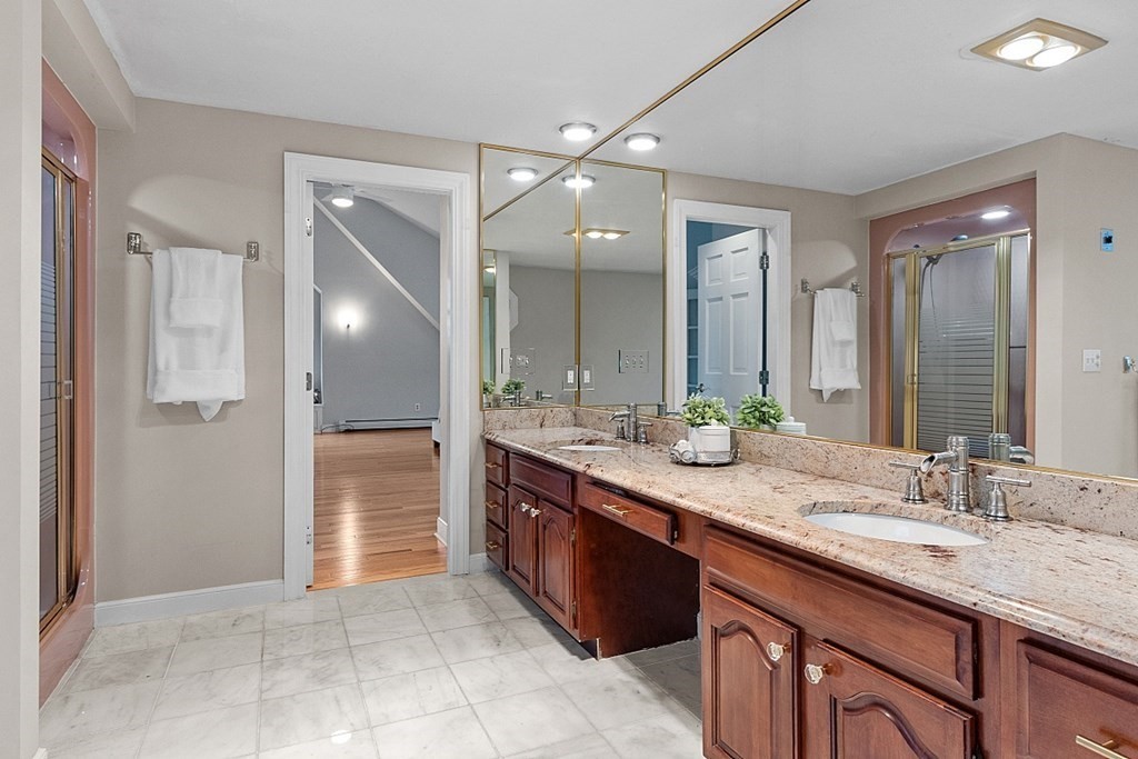 49 Central Tree Road Rutland, MA 01543 - Photo 25 of 42 a spacious bathroom with a granite countertop sink and a mirror