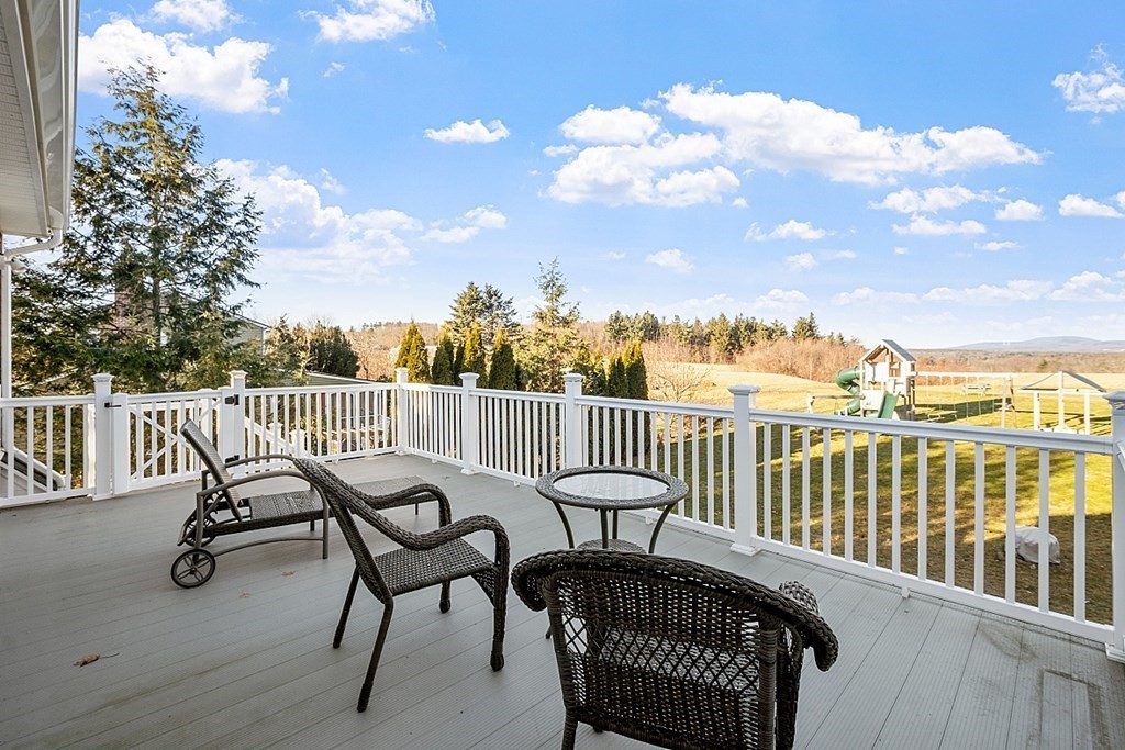 49 Central Tree Road Rutland, MA 01543 - Photo 33 of 42 a view of a chair and table on the deck
