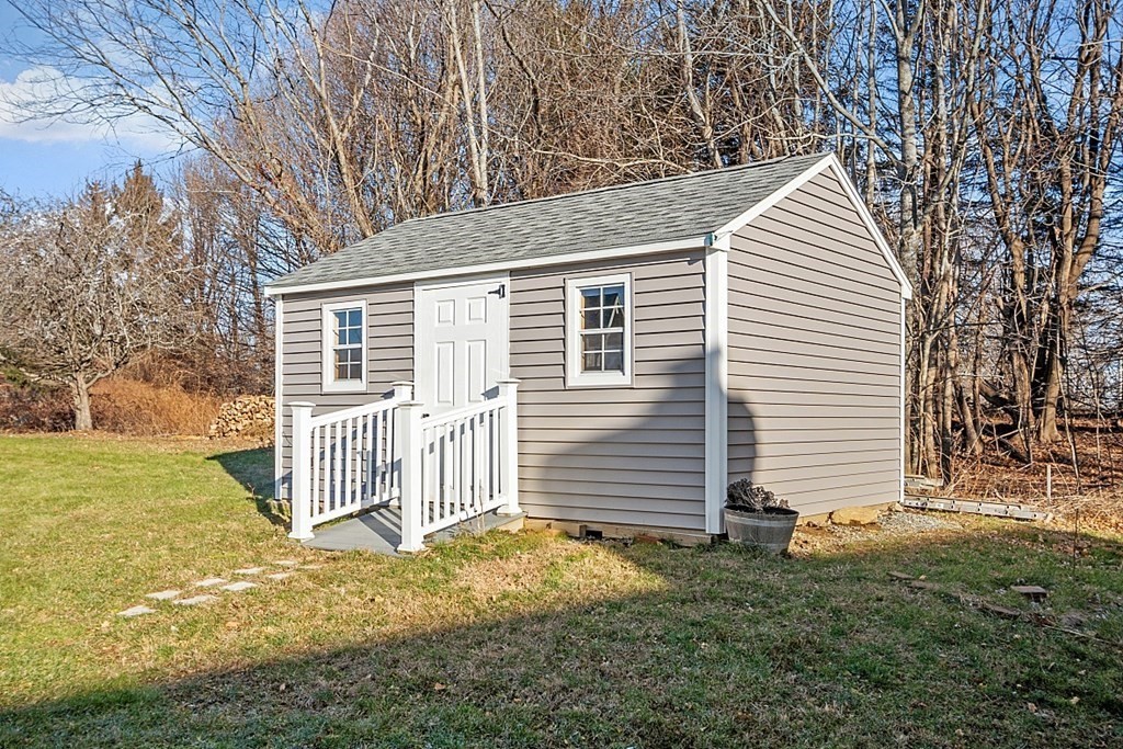 49 Central Tree Road Rutland, MA 01543 - Photo 38 of 42 a view of a house with a yard and fence