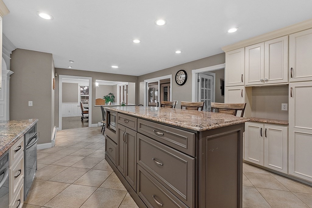 49 Central Tree Road Rutland, MA 01543 - Photo 8 of 42 a kitchen with granite countertop a sink and cabinets
