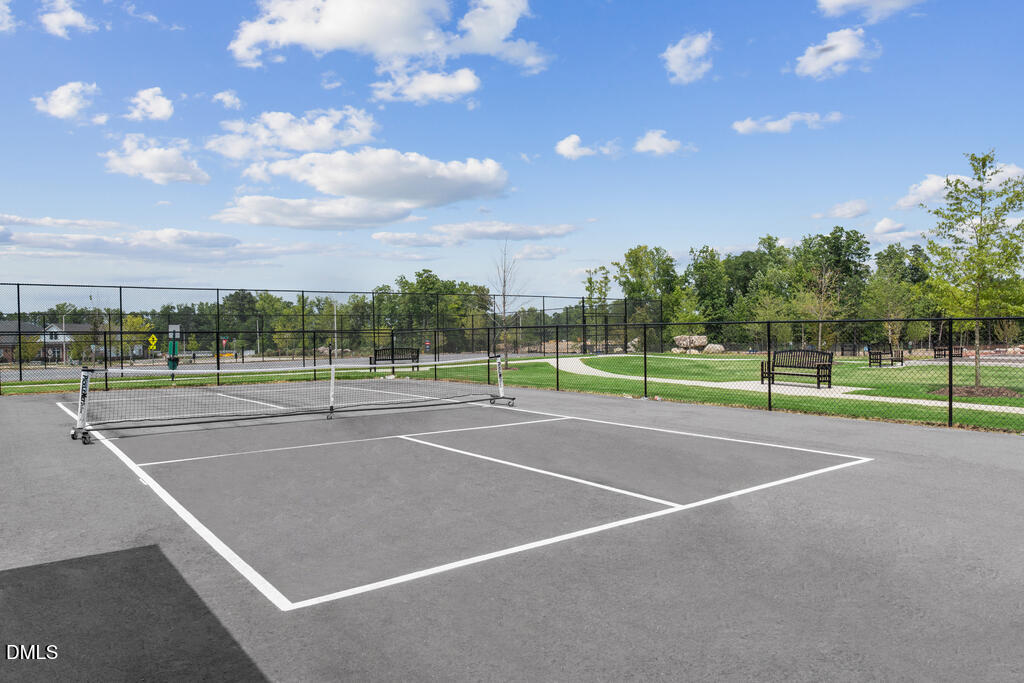 2032 Abbeyhill Drive, Unit 100 Raleigh, NC 27610 - Photo 7 of 7 a view of a tennis court