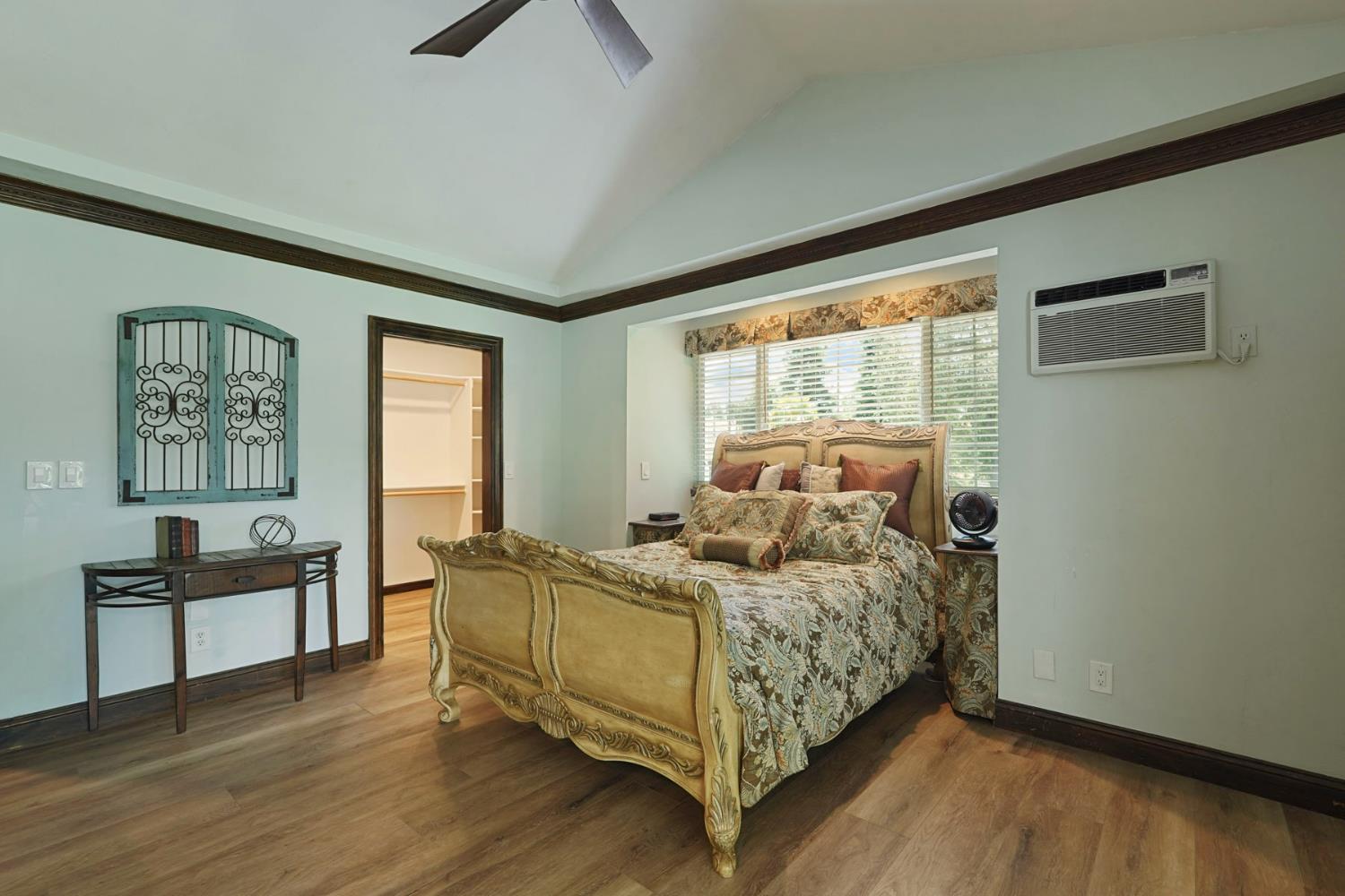 5407 Butler Road Penryn, CA 95663 - Photo 19 of 69 a bedroom with a bed and wooden floor